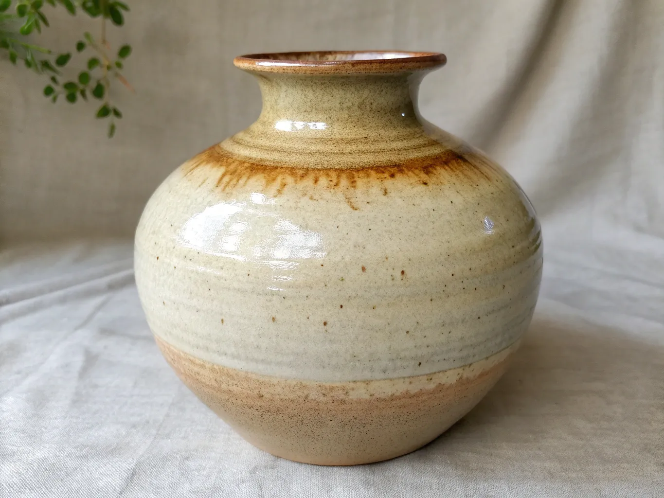 Hand-thrown ceramic vase with natural glaze